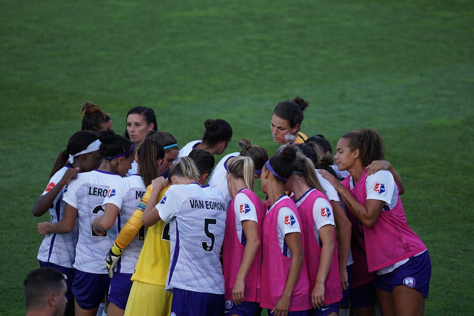 womens soccer huddle.jpeg